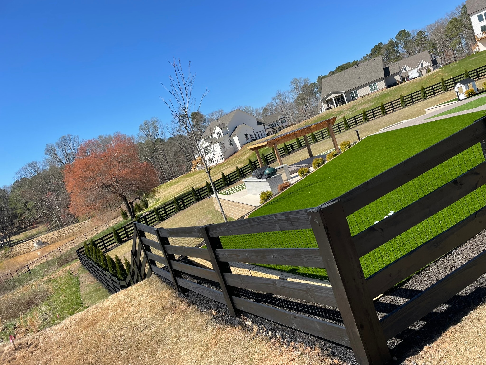 Rural estate with black fencing